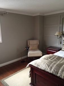 The chair is a natural velvet colour - and looks pretty when I place my table lamp and side table... the mirrored side table is at the client's house that I staged...